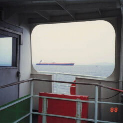 1988-03-20 東京湾フェリーからの景色<br>フェリーから見る海と貨物船